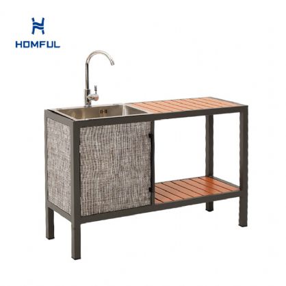 Cocina exterior con estructura de...