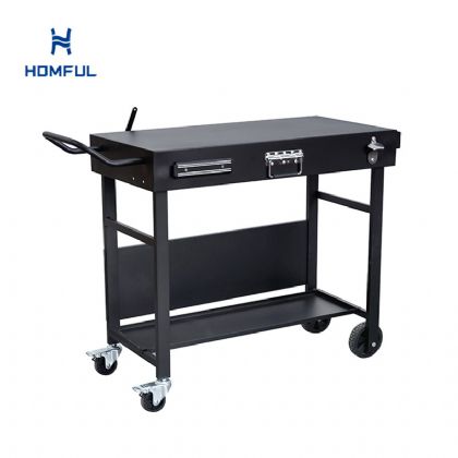 Cocina exterior de hierro con mesa plegable grande