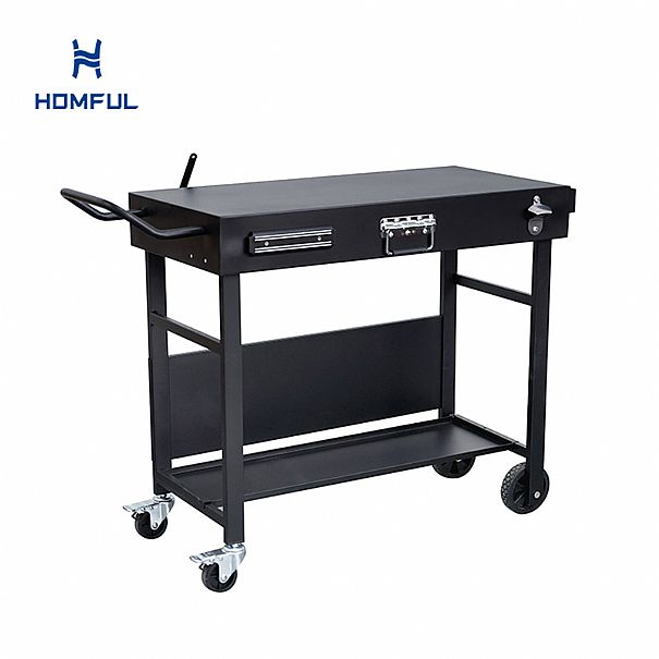 Cocina exterior de hierro con mesa plegable grande